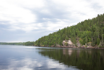Fototapeta na wymiar Mountain lake in the forest