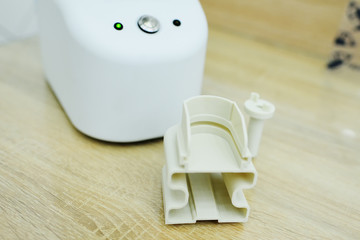 modern cosmetic device for hair restoration and regeneration in close-up.