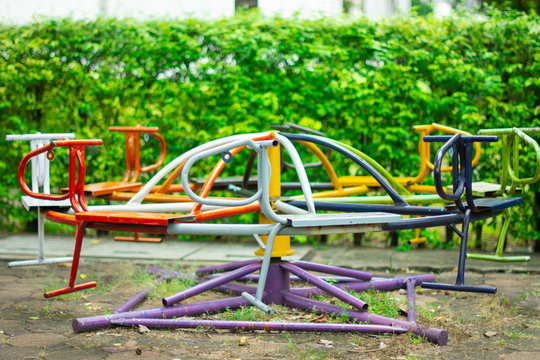 Colorful children's merry-go-round in the playground.