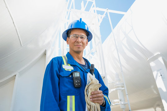 Portrait of confident male worker at gas plant