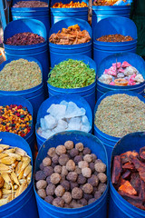 Spices and herbs being sold on street stal at Marrakech traditional market, Morocco.