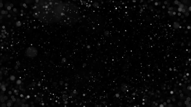 Motion animation of a large number of shiny defocused balls on a black background HD