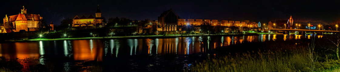 River Nogat and Malbork city by night - panoramic view - Malbork, Pomerania, Poland