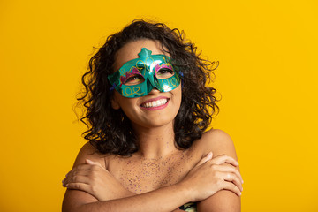 Brazilian Carnival. Young woman in costume enjoying the carnival party.
