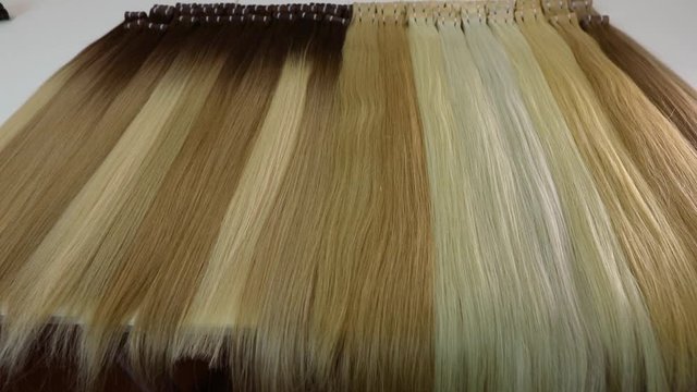 Long beautiful female hair, Natural hair extensions, artificial long female hair in light shades