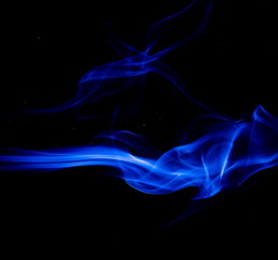 Blue smoke on black background