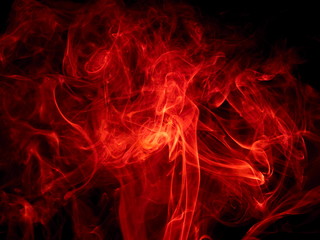 Red smoke on black background