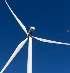wind turbine on background of blue sky