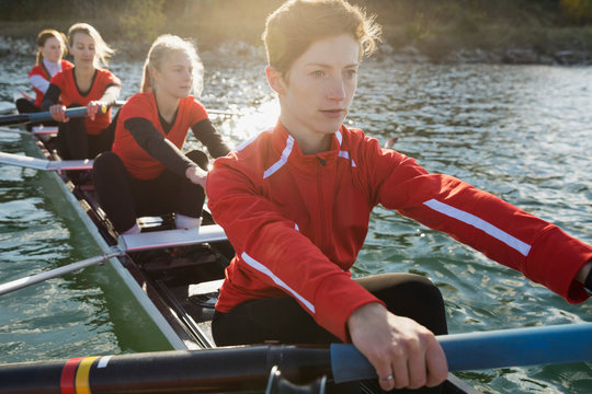 Rowing team in scull on river