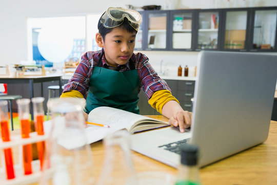 Elementary student using laptop in laboratory