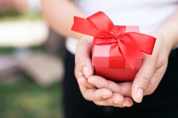 A woman with a gift box for a lover on Valentine's Day, New Year's Day, Christmas Day