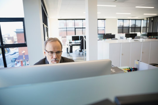 Businessman working at computer in office