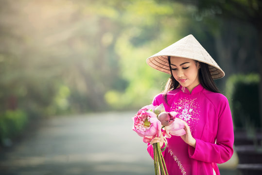 Beautiful woman with Vietnam culture traditional, Ao dai is famous traditional costume