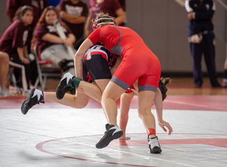 Fototapeta premium High School wrestlers competing at a wrestling meet