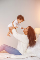 Love of a mother and baby. Family at home. Lifestyle
