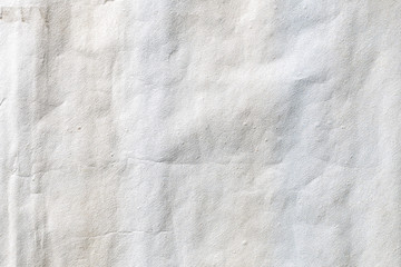 Grey mixed with yellow crumpled background paper texture