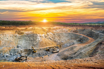 Aerial view of opencast mining quarry with lots of machinery at work - view from above.This area has been mined for copper, silver, gold, and other minerals,Thailand - obrazy, fototapety, plakaty