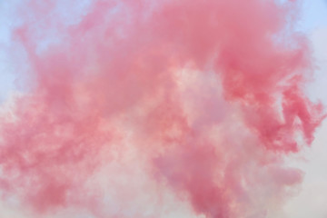 Fototapeta na wymiar Pink smoke in the sky