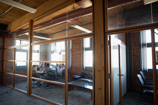 Business People Meeting In Loft Office