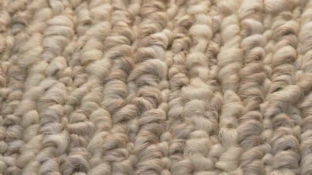 Macro closeup soft beige carpet rug texture