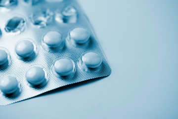 Foil packaging for tablets on a table