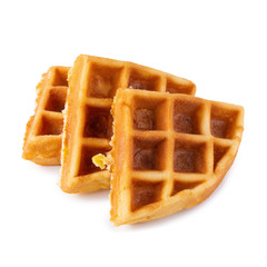 Freshly baked waffles isolated over white background.