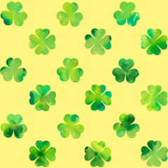 Watercolor clover leaves on yellow background.  Seamless pattern. Watercolor illustration. St.Patrick's day.