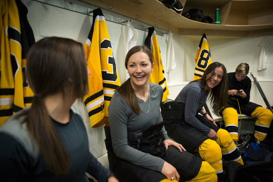 Laughing Women Ice Hockey Players Dressing Locker Room