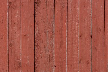 Fototapeta premium closeup of old red wood planks texture background