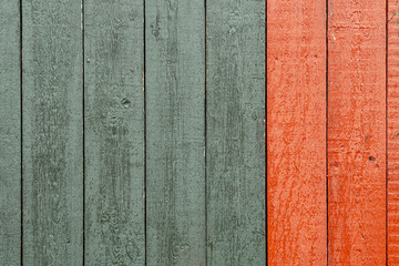 closeup of old red and green wood planks texture background