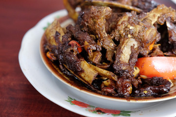 Tengkleng Kambing Pak manto, Solo, Central Java, Indonesia. Traditional Indonesian spicy food made from the bones of goat.