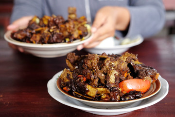 Tengkleng Kambing Pak manto, Solo, Central Java, Indonesia. Traditional Indonesian spicy food made from the bones of goat.