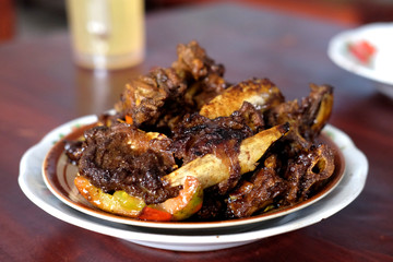 Tengkleng Kambing Pak manto, Solo, Central Java, Indonesia. Traditional Indonesian spicy food made from the bones of goat.