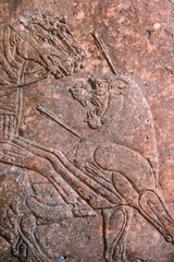 hunting lion relief
