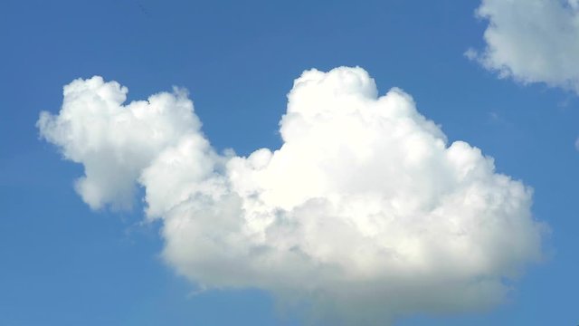 pure heap white cloud rolling on blue sky time lapse1