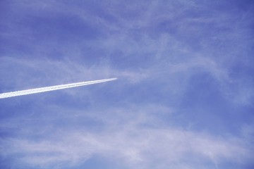 airplane in blur bright sky in high resolution 