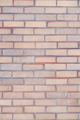 washed out orange and brown brick wall texture background