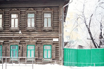 ancient wooden house in winter