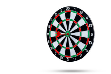 Red dart arrow hitting in the target center is Dart board Isolated on White background
