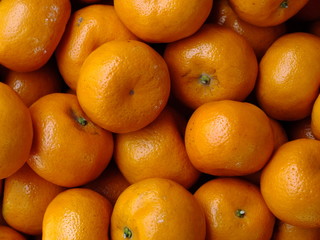  macro image of bright orange shiny juicy oranges 