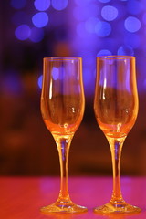 two glasses of wine in a romantic setting on February 14, we celebrate Valentine's day together, champagne and love