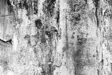 Texture of a concrete wall with cracks and scratches which can be used as a background