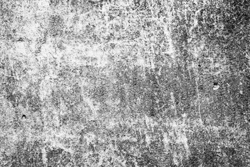 Fototapeta premium Texture of a concrete wall with cracks and scratches which can be used as a background
