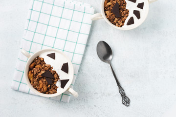 Granola, oatmeal with chocolate food background