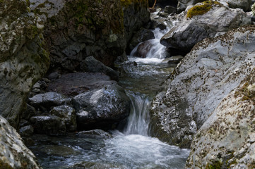 Small waterfalls are formed by the flow of the river