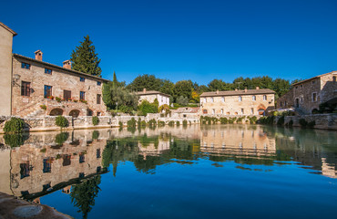 Fototapeta na wymiar View of antique thermal baths in the medieval village Bagno Vignoni, Tuscany, Italy