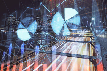 Forex chart on cityscape with tall buildings background multi exposure. Financial research concept.