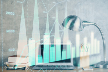 Multi exposure of graph and financial info and work space with computer background. Concept of international online trading.