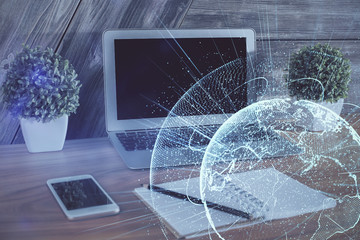 Computer on desktop with social network theme icon. Multi exposure. Concept of international...