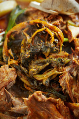 Korean spicy braised pork and leaf vegetable 